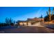 Exterior features desert landscaping, Southwestern architecture, and a covered drive at 612 N Signal Butte Rd, Mesa, AZ 85207
