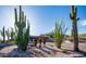 Exterior features desert landscaping, Southwestern architecture, and exterior art at 612 N Signal Butte Rd, Mesa, AZ 85207