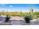 Front yard with desert landscaping and mountain views at 612 N Signal Butte Rd, Mesa, AZ 85207
