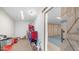 Spacious garage area with barn door and extra room at 612 N Signal Butte Rd, Mesa, AZ 85207