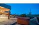 Hot tub and stone patio with desert landscaping at 612 N Signal Butte Rd, Mesa, AZ 85207