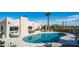 Backyard pool area with patio, desert landscaping, and Southwestern architecture at 612 N Signal Butte Rd, Mesa, AZ 85207
