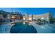 Backyard pool surrounded by desert landscaping and views at 612 N Signal Butte Rd, Mesa, AZ 85207