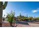 Native ocotillo and saguaro cactus blend into the landscape at 612 N Signal Butte Rd, Mesa, AZ 85207