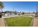 Spacious backyard with lush lawn and ample space for outdoor enjoyment at 615 E Mckellips Rd, Tempe, AZ 85288