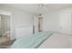 This bedroom has a white dresser and access to an en-suite bathroom at 615 E Mckellips Rd, Tempe, AZ 85288