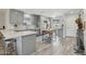Modern kitchen featuring stainless steel appliances, an island, and sleek gray cabinets at 615 E Mckellips Rd, Tempe, AZ 85288