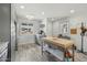 Well-lit kitchen with stainless steel appliances, modern cabinetry, and wood-look floors at 615 E Mckellips Rd, Tempe, AZ 85288