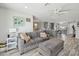 Comfortable living room showcases an open floor plan with a seamless connection to the kitchen at 615 E Mckellips Rd, Tempe, AZ 85288