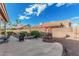 Enjoy a private backyard with a soothing water feature and desert landscaping at 6331 S Cypress Point Dr, Chandler, AZ 85249