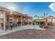 Beautiful backyard offers an extended patio, rock landscaping, and a relaxing ambiance at 6331 S Cypress Point Dr, Chandler, AZ 85249
