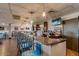 Stylish bar area featuring comfortable seating, a well-stocked counter, and mounted televisions at 6331 S Cypress Point Dr, Chandler, AZ 85249