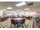 Inviting community room with comfortable seating arrangements and a well-stocked library at 6331 S Cypress Point Dr, Chandler, AZ 85249