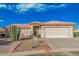 Charming single-story home with a well-maintained yard and a two-car garage at 6331 S Cypress Point Dr, Chandler, AZ 85249