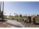 Scenic golf course view featuring mature trees, water features, and meticulously manicured greens at 6331 S Cypress Point Dr, Chandler, AZ 85249