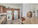 Spacious kitchen with ample cabinet space, granite countertops, and modern appliances at 6331 S Cypress Point Dr, Chandler, AZ 85249