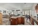 Open floor plan showcasing the dining and kitchen areas, with abundant natural light at 6331 S Cypress Point Dr, Chandler, AZ 85249