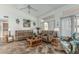 Bright living room showcasing neutral tones, tiled flooring and lots of natural light at 6331 S Cypress Point Dr, Chandler, AZ 85249