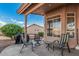 Covered patio includes seating area for relaxation and entertaining at 6331 S Cypress Point Dr, Chandler, AZ 85249
