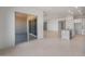 Bright living room featuring modern design, tile floors, and sliding glass doors at 662 W Rock Needle Trl, Apache Junction, AZ 85120