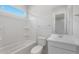 Spotless bathroom featuring a shower-tub combination and a white single sink vanity at 674 W Rock Needle Trl, Apache Junction, AZ 85120
