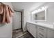 Bathroom with a door to a toilet and quartz countertop at 8260 E Arabian Trl # 257, Scottsdale, AZ 85258