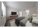 Spacious bedroom featuring natural light, modern furnishings, and hardwood floors at 8260 E Arabian Trl # 257, Scottsdale, AZ 85258