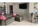 Cozy living room with a large sectional sofa and tile flooring at 849 W Duke Dr, Tempe, AZ 85283