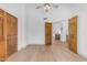 Spacious room with hardwood floors, ample closet space, and natural light at 9736 E Turquoise Ave, Scottsdale, AZ 85258