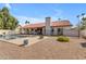 Backyard with pool, tiled patio, gravel and desert landscaping at 9736 E Turquoise Ave, Scottsdale, AZ 85258