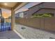 Covered back patio showcasing a spacious layout, perfect for entertaining and relaxation at 9916 E Texas Ave, Mesa, AZ 85212