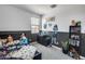 Lovely bedroom featuring a comfortable bed, playful decor, and ample storage space at 9916 E Texas Ave, Mesa, AZ 85212