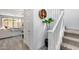 Welcoming entryway with stairs, a plant, and views to an adjacent living space at 9916 E Texas Ave, Mesa, AZ 85212