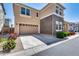 Charming two-story home with a two-car garage and meticulously landscaped front yard at 9916 E Texas Ave, Mesa, AZ 85212