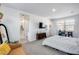 Bright main bedroom with a walk-in bathroom, neutral colors, and lots of natural light at 9916 E Texas Ave, Mesa, AZ 85212