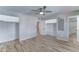 Spacious bedroom featuring an ensuite bathroom, ceiling fan, and convenient closet at 10016 N 39Th Dr, Phoenix, AZ 85051