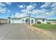 Charming single-story home showcasing a well-maintained front yard and driveway with a basketball hoop at 10016 N 39Th Dr, Phoenix, AZ 85051