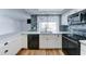 Open kitchen with stainless steel appliances, tile backsplash and a view of the pool at 10016 N 39Th Dr, Phoenix, AZ 85051