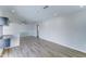 Open-concept space with modern flooring, connecting living and dining areas at 10016 N 39Th Dr, Phoenix, AZ 85051