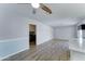 Open concept living area featuring modern flooring and convenient laundry access at 10016 N 39Th Dr, Phoenix, AZ 85051