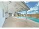 Spacious backyard with a pool, slide, and covered patio ideal for entertaining at 10016 N 39Th Dr, Phoenix, AZ 85051