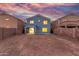 Wide backyard view showcasing the home's exterior and the potential for outdoor living and entertaining space at 10831 E Azalea Ave, Mesa, AZ 85208