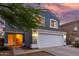 Charming two-story home featuring a large two car garage, beautiful blue siding, and a lovely tiled roof at 10831 E Azalea Ave, Mesa, AZ 85208