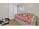 Cozy bedroom with a twin bed, neutral colors, and lots of storage space at 12605 W Dreyfus Dr, El Mirage, AZ 85335