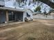 Backyard with several chairs, the rear of the home, and a block wall, perfect for outdoor living at 12607 N 23Rd St, Phoenix, AZ 85022