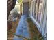 Charming front porch with stylish slate tile, bench, and large windows at 12607 N 23Rd St, Phoenix, AZ 85022