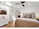 Bright bedroom with skylight, dresser, neutral color palette and serene ambiance at 13034 N 69Th St, Scottsdale, AZ 85254
