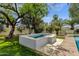 Relaxing backyard jacuzzi surrounded by mature landscaping and beautiful pavers at 13034 N 69Th St, Scottsdale, AZ 85254