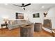 Comfortable living room with ample seating, a fireplace, and stylish decor at 13034 N 69Th St, Scottsdale, AZ 85254