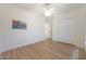 Clean bedroom featuring tile floors and a large closet at 13458 W Coronado Rd, Goodyear, AZ 85395